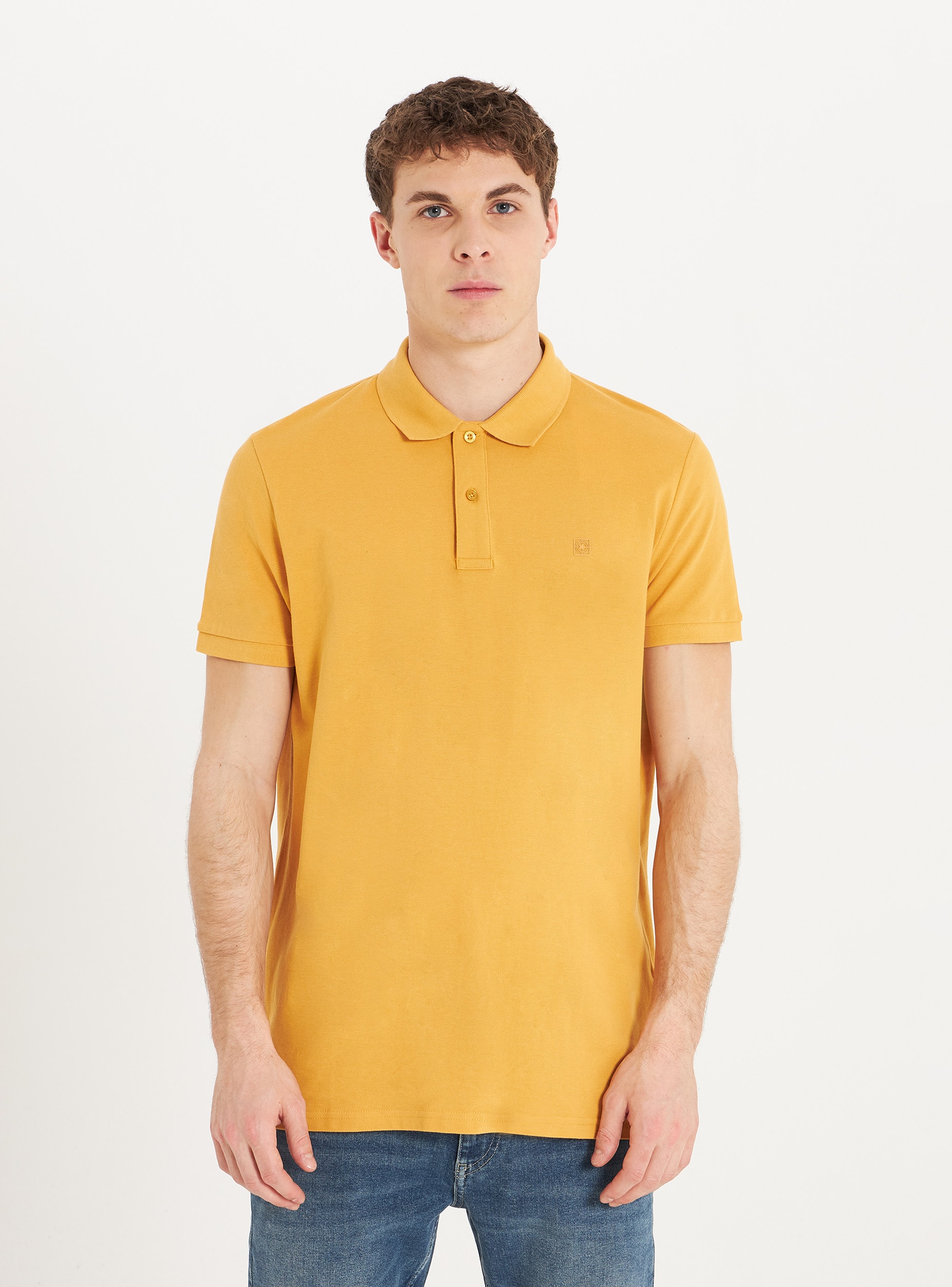 mustard polo shirt