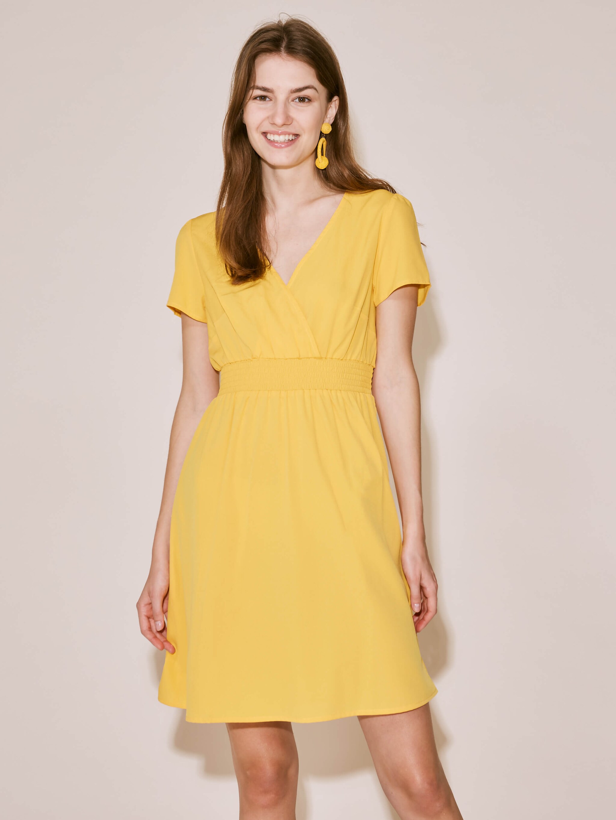 yellow flared dress