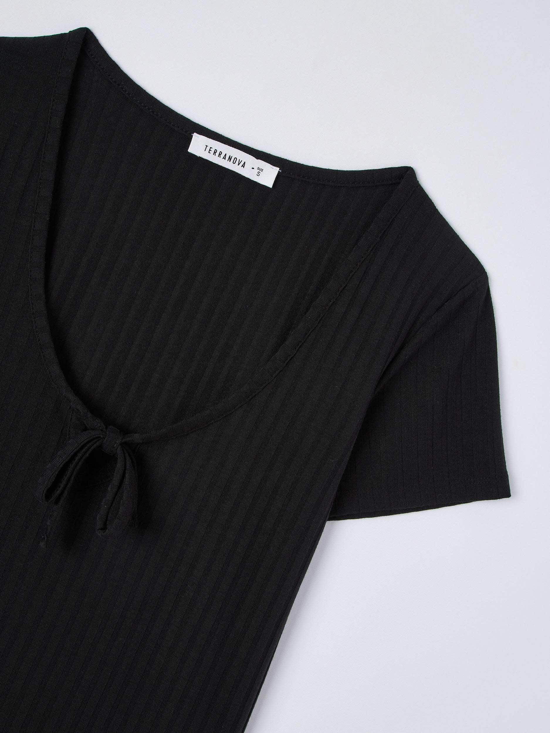 black plunging neckline top